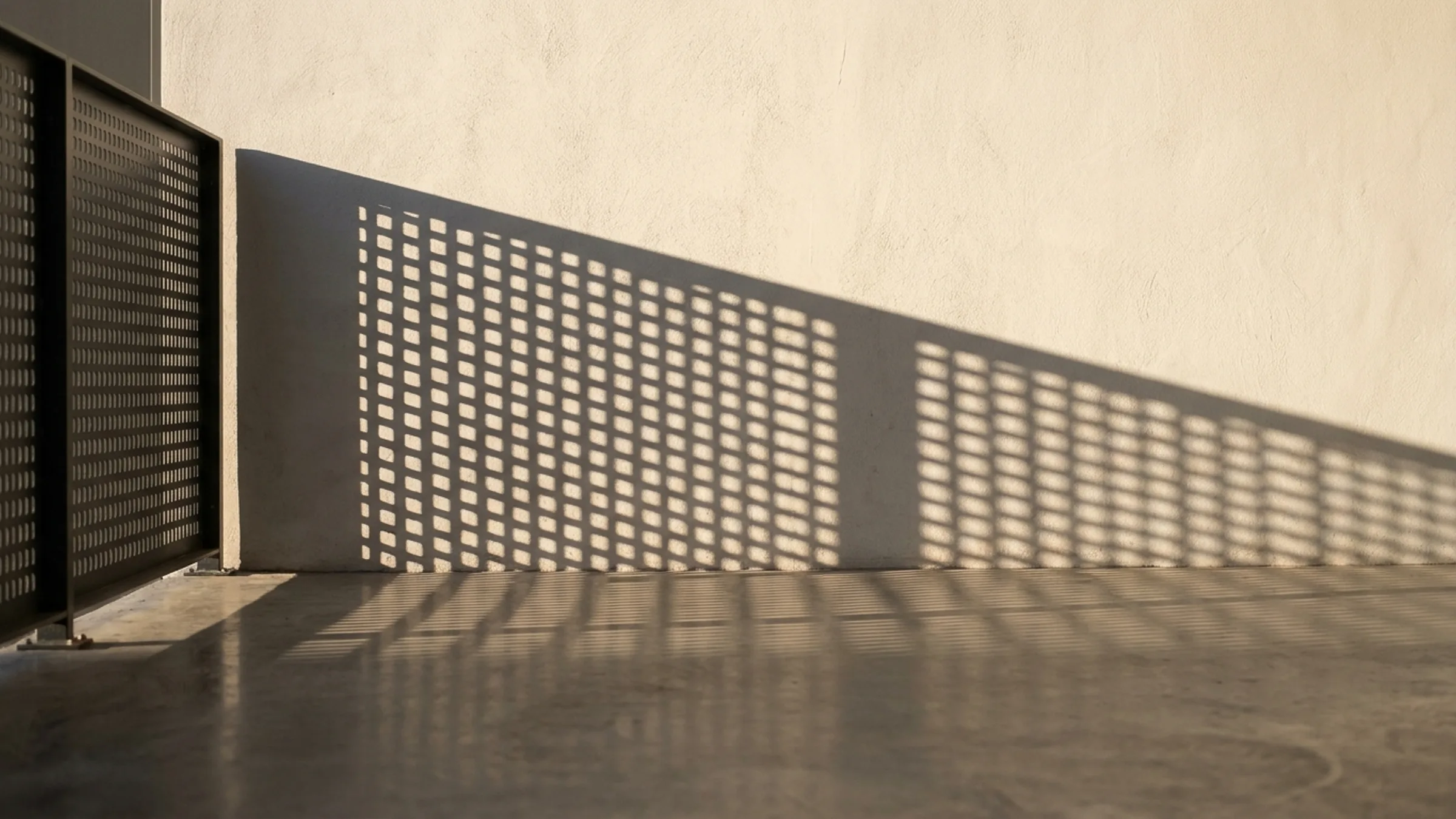 Fence panels — cast shadow in low sun