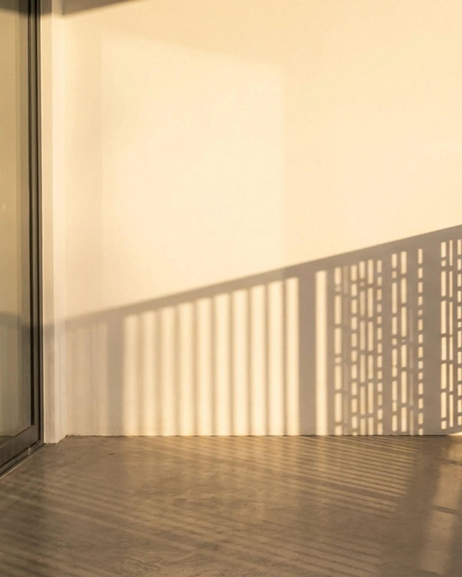 Laser-cut aluminium infill panels fitted into a balcony balustrade frame